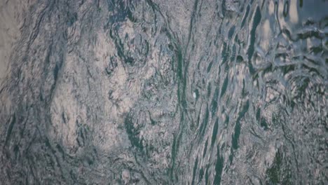 vertical shot of vortex of water at saltstraumen maelstrom phenomenon in norway