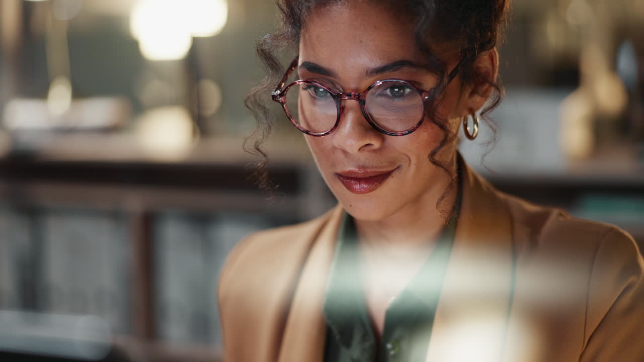 Focused businesswoman working late at night