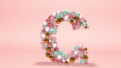 Letter-G-made-of-beads,-glass-balls,-pastel-pearls,-crystal-jewels-and-gold