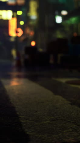 Urban night scene with wet streets reflecting colorful lights in alleyway
