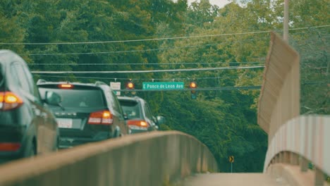 cars pass over an active bridge during rush hour