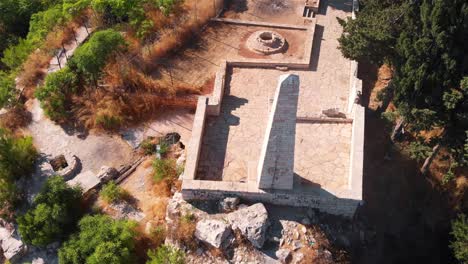 aerial view of ancient stone ruins and arid landscape