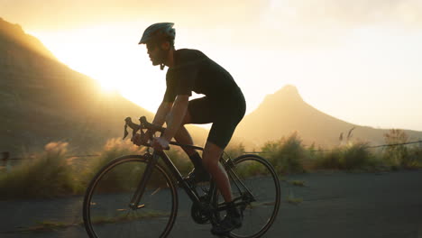 fitness, man and cycling on road in mountain