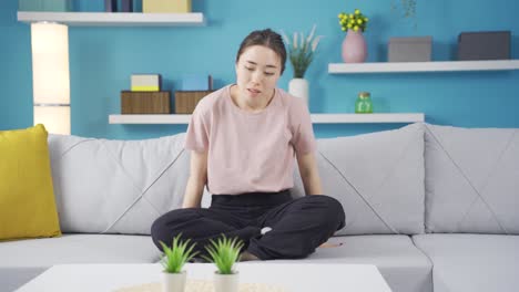 cheerful asian teenage girl practicing yoga.