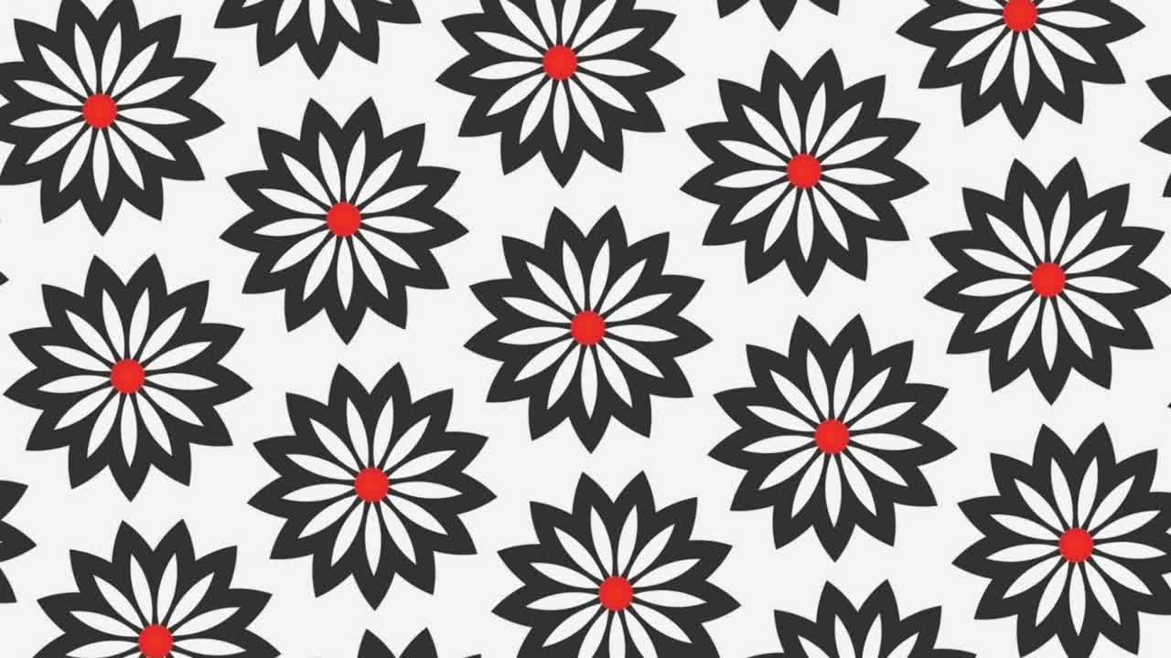 Rotierende Bewegtgrafik mit blumenartigen Elementen auf weißem Hintergrund