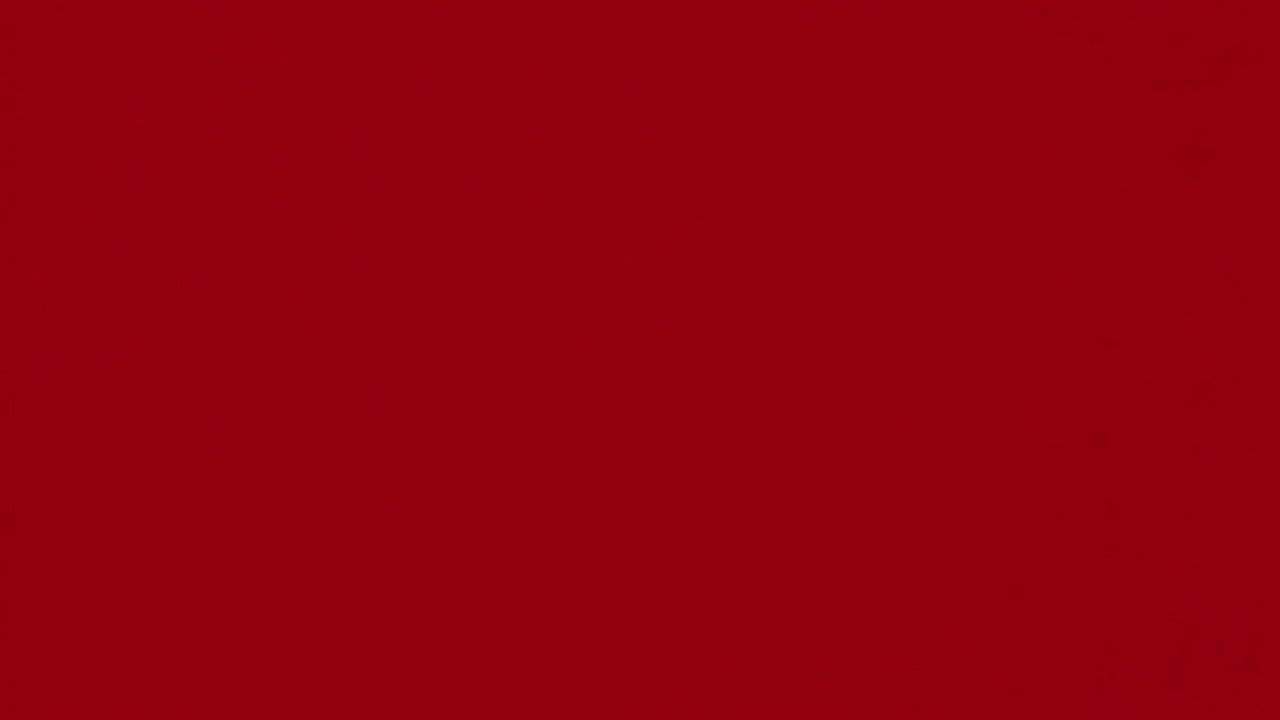 Foglio di carta rosso che si dispiega su sfondo nero
