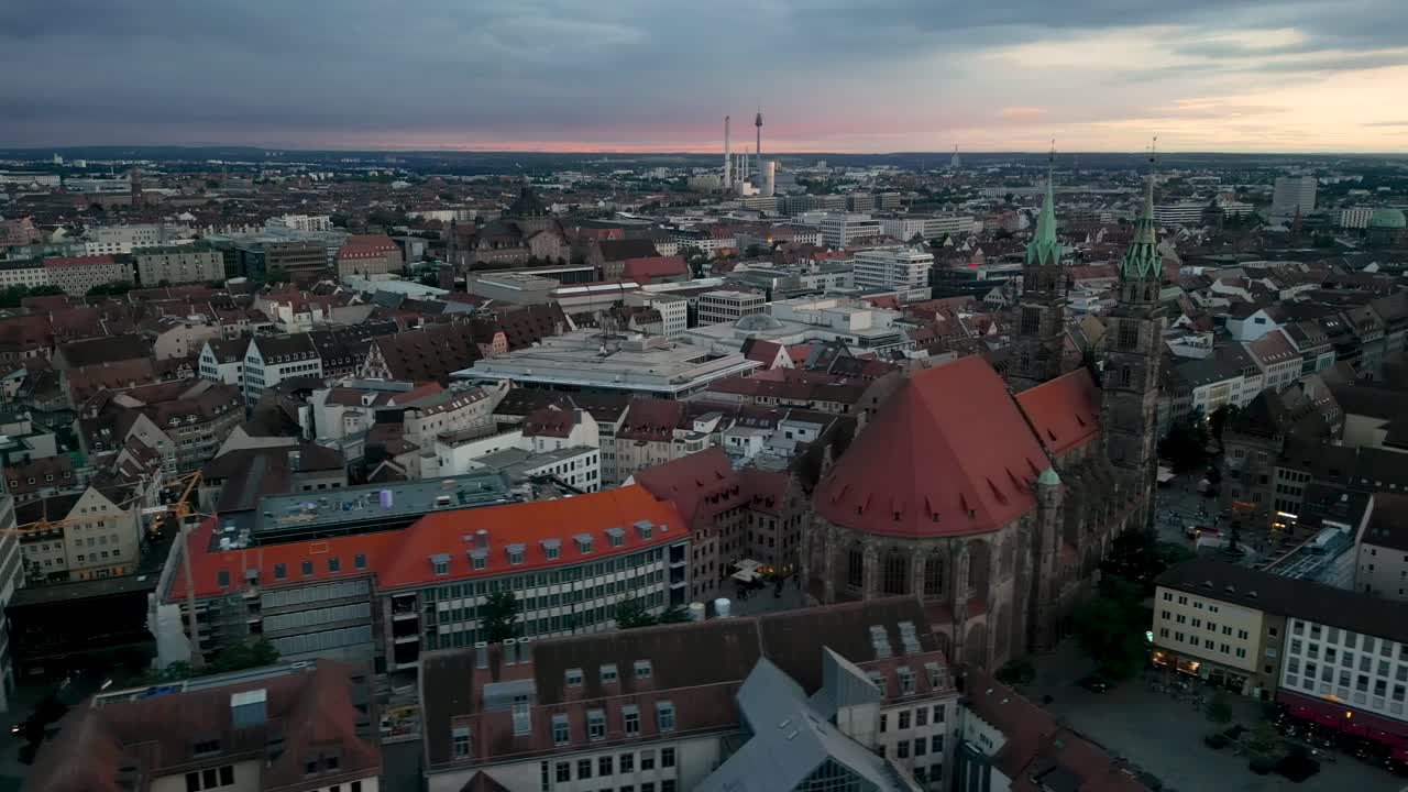 4K Aerial Drone Video of the Historic Buildings of Downtown Nurnberg, Germany featuring Nuremberg State Theater and St. Lorenz Church