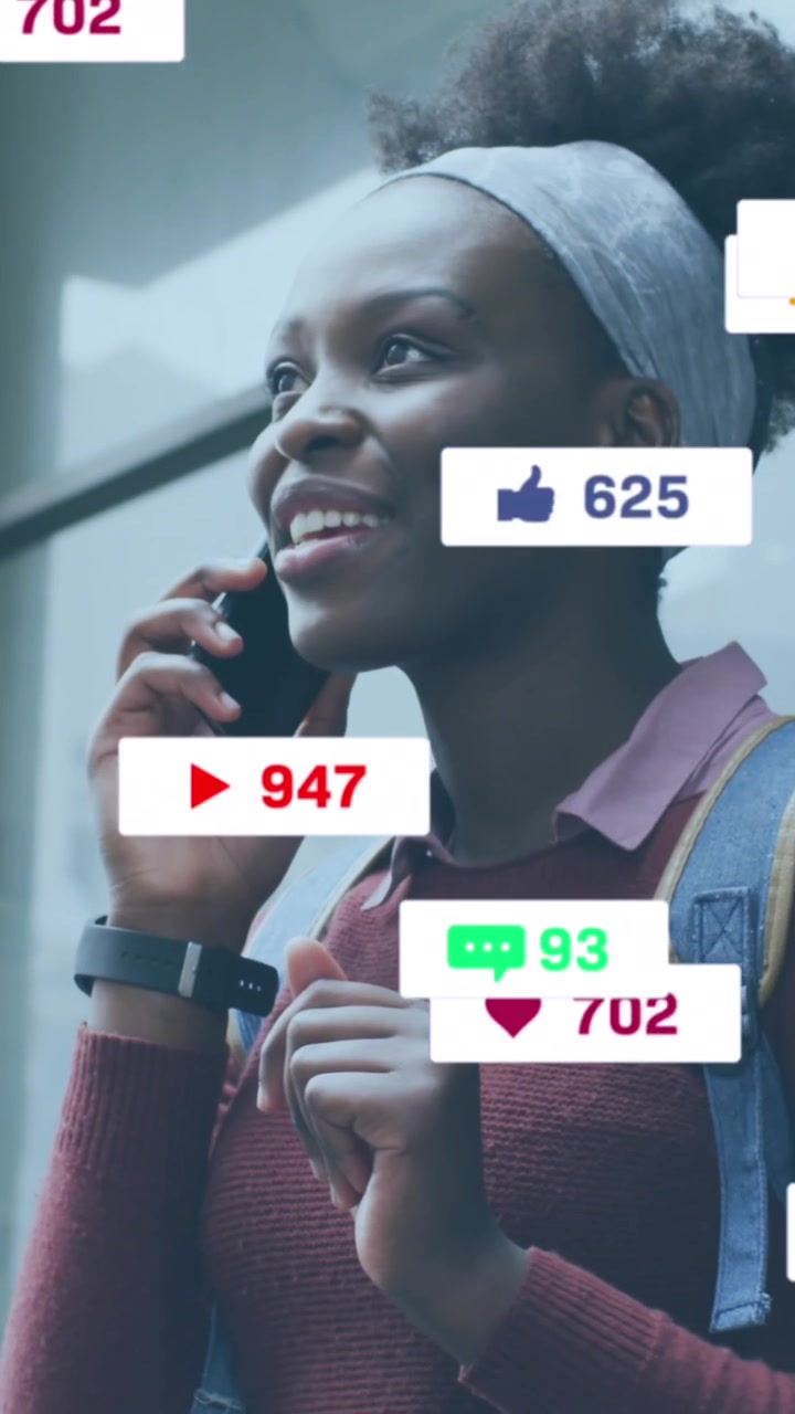 Animation of social media icons with numbers over african american woman talking on smartphone