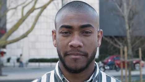 closeup view of handsome african american man looking at camera