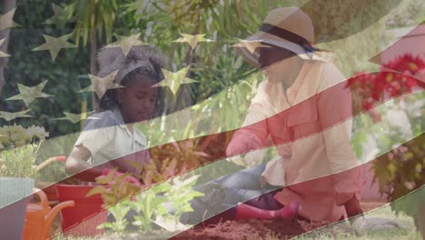Animation-of-american-flag-over-mother-with-daughter-working-in-garden