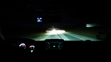 timelapse of driving a car on night road