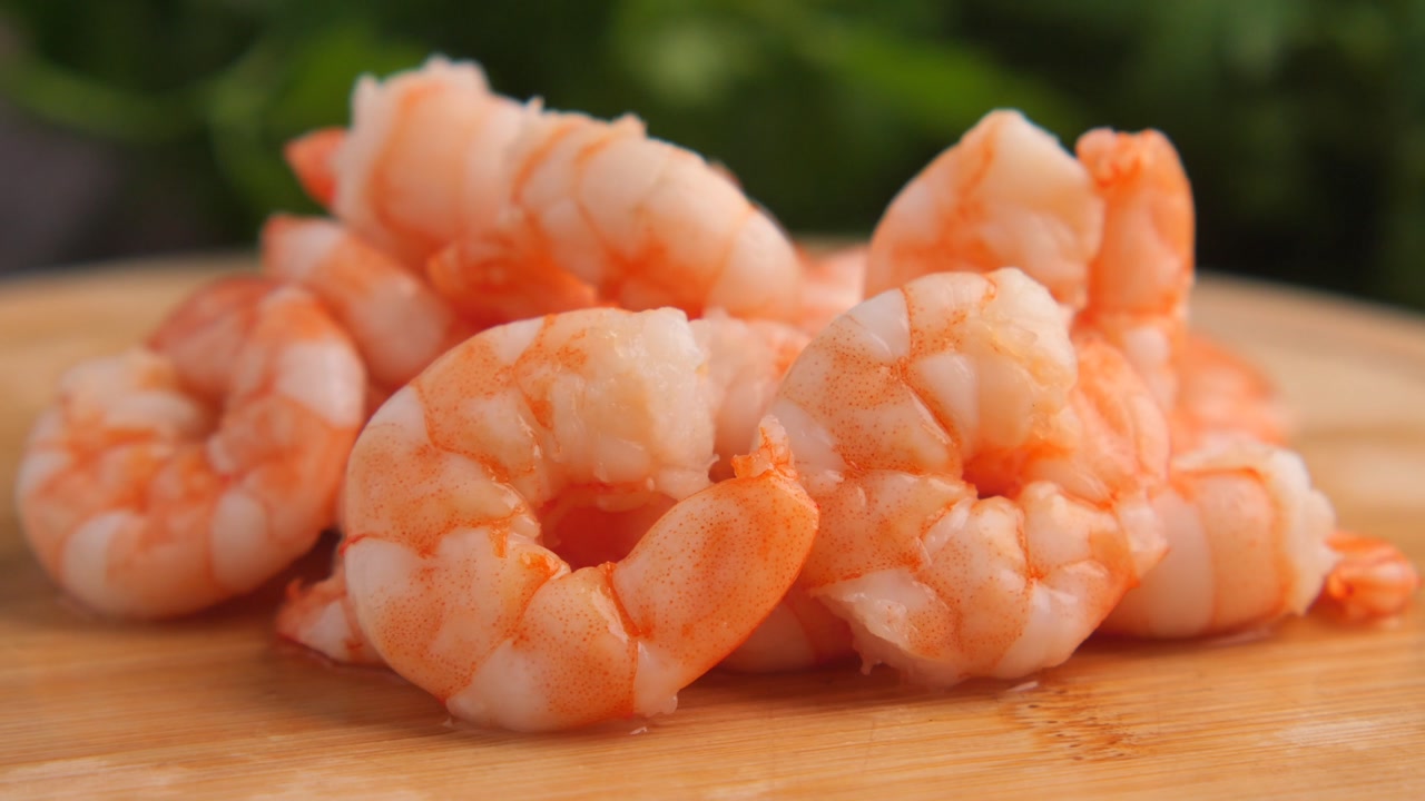 Close-up of Fresh Cooked Shrimp on a Wooden Cutting Board