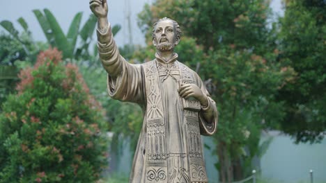 various statues in the park inside bandel church