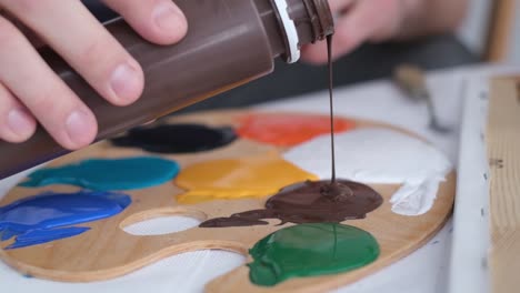 super slow motion 240 fps creative artist paints an abstract picture with colorful paints - super slow motion 240 fps, creative artist paints an abstract picture with colorful paints. contemporary works of art on canvas