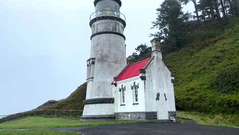 heceta head lighthouse on rainy day, oregon. tilt-up