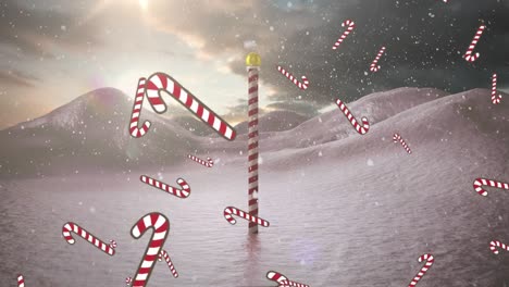 animation of falling candy canes over winter scenery with north pole sign