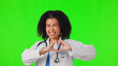 Heart-sign,-hands-or-woman-doctor-on-green-screen