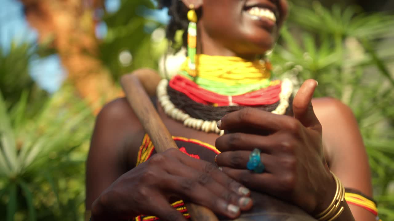 Exquisite Adornments Grace the African Woman Belonging to the Karamojong Tribe in Uganda, East Africa - Close Up