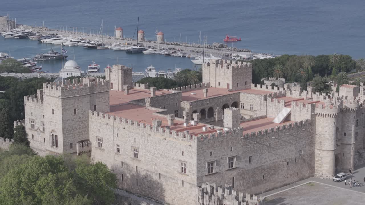 Stunning aerial perspective of aerial drone overhead view video of rhodes old town castle architecture, seen from above, greece. scenery of european town. Tigh shot 3x tele lens. D-Log M