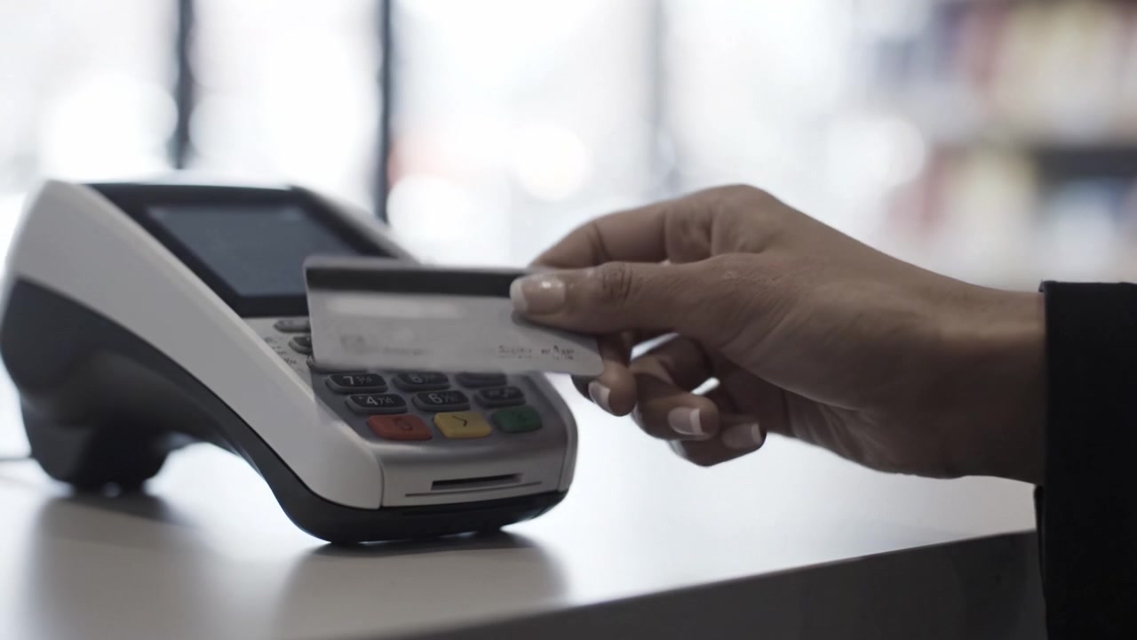 Modern Payment Terminal Positioned on a Table, Highlighting Convenience in Transaction Processing in Retail or Service Environments with Clear Focus and Soft Background