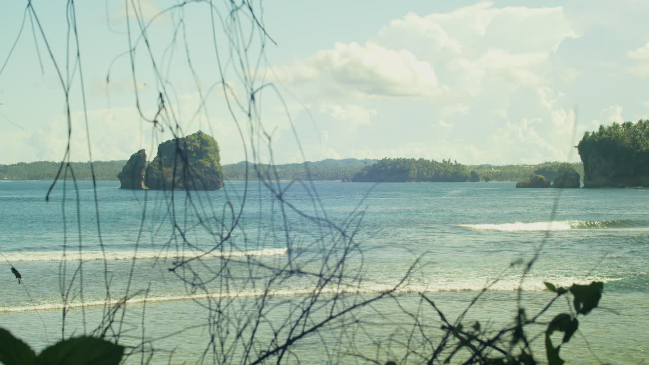 A serene afternoon view of the beach from Pilar, Siargao Island, Philippines.
