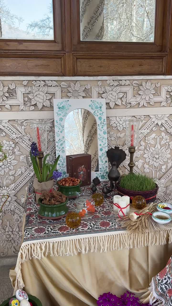 Vertical video of traditional ritual for Nowruz ceremony design Haftsin table Tehran palace outdoor garden mansion wooden frame plaster moulding festive spring Iranian culture architecture decoration