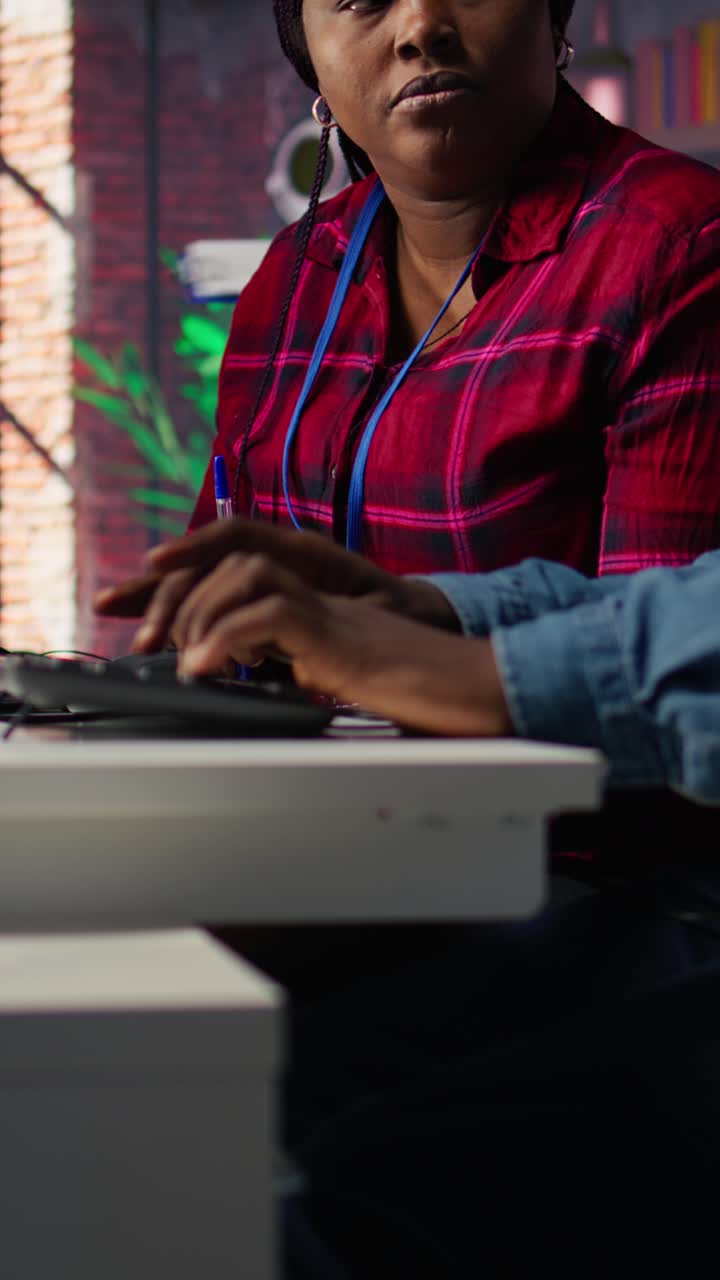 Vertical video Call center coworkers brainstorming how to answer customers, using AI chatbot