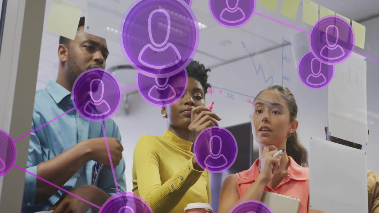 Collaborating on project, diverse team using animation with digital user icons