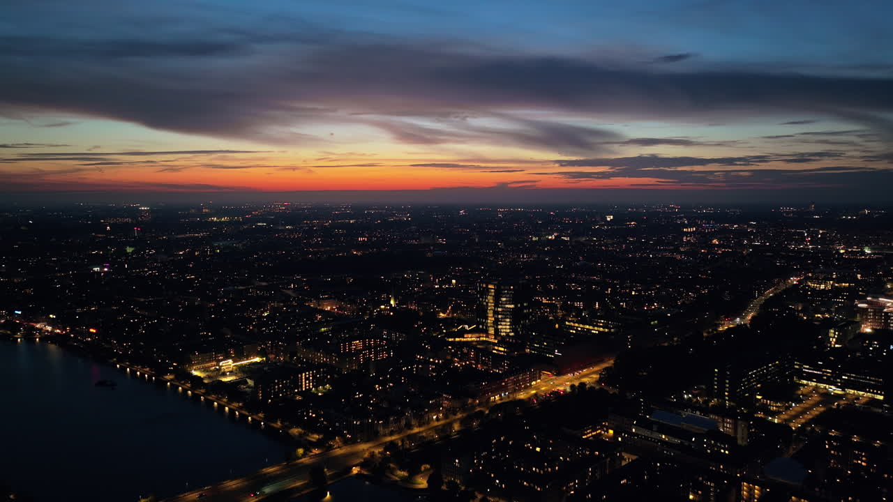 Aerial drone view of the city centre of Copenhagen, Denmark at sunset