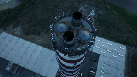 aerial view on the top of a chimney, camera moving backwards