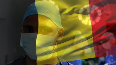 animación de agitar la bandera de bélgica contra un cirujano afroamericano en el hospital.