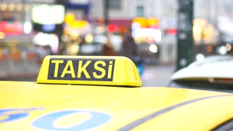 yellow taxi in a city street