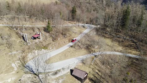 drone of a winding mountain road with sharp turns in slovenia's remote landscape