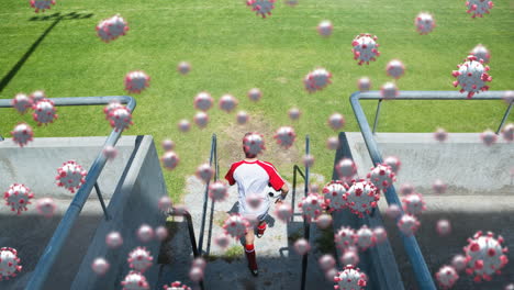 células de covid-19 contra el hombre que camina en el campo deportivo