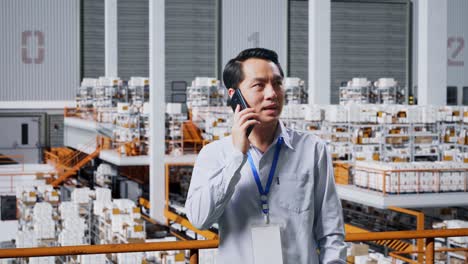 warehouse employee talking on phone