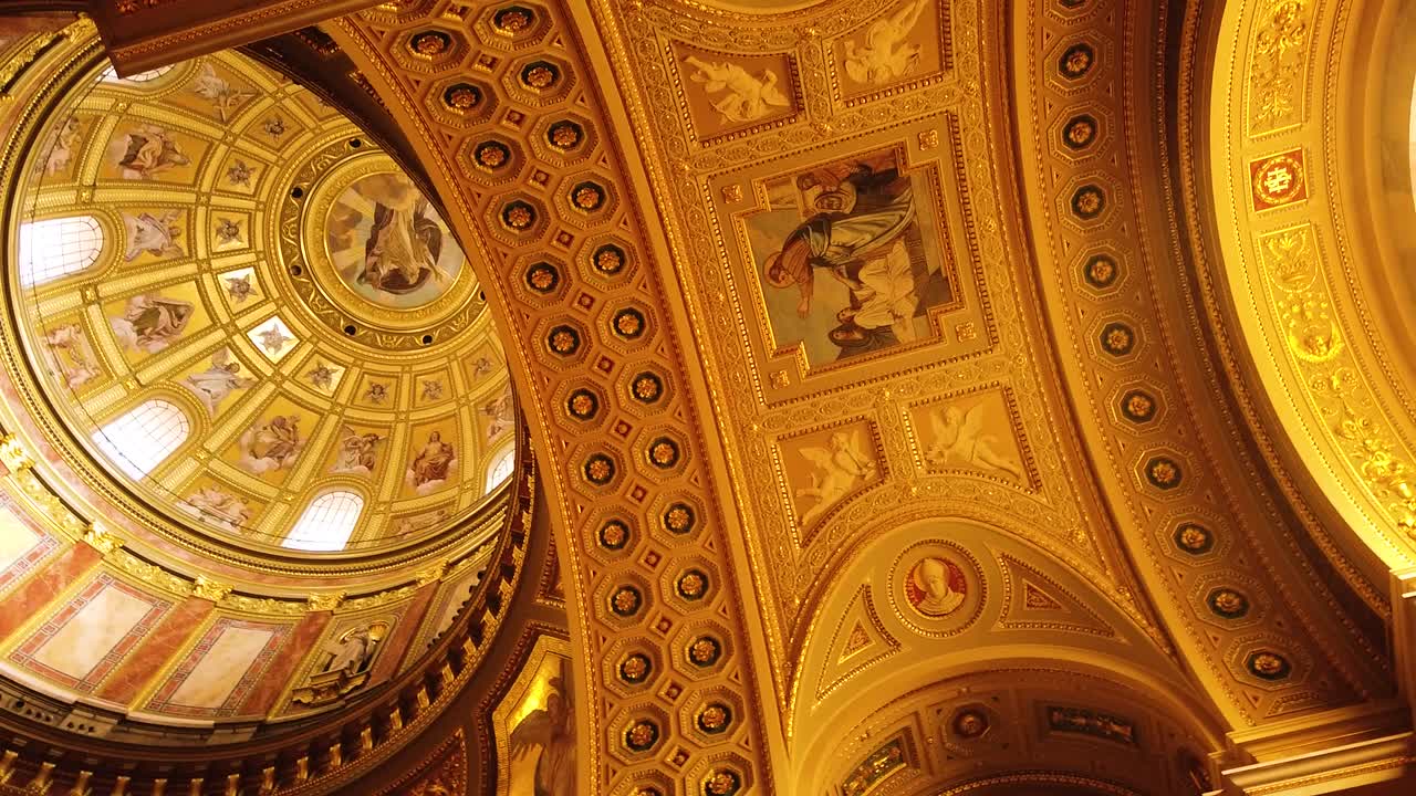 Ceilings and painting on top of I St. Stephen's Basilica (Szent Istvan Bazilika). Catholic Cathedral and one of the main attractions in Budapest with camera movement