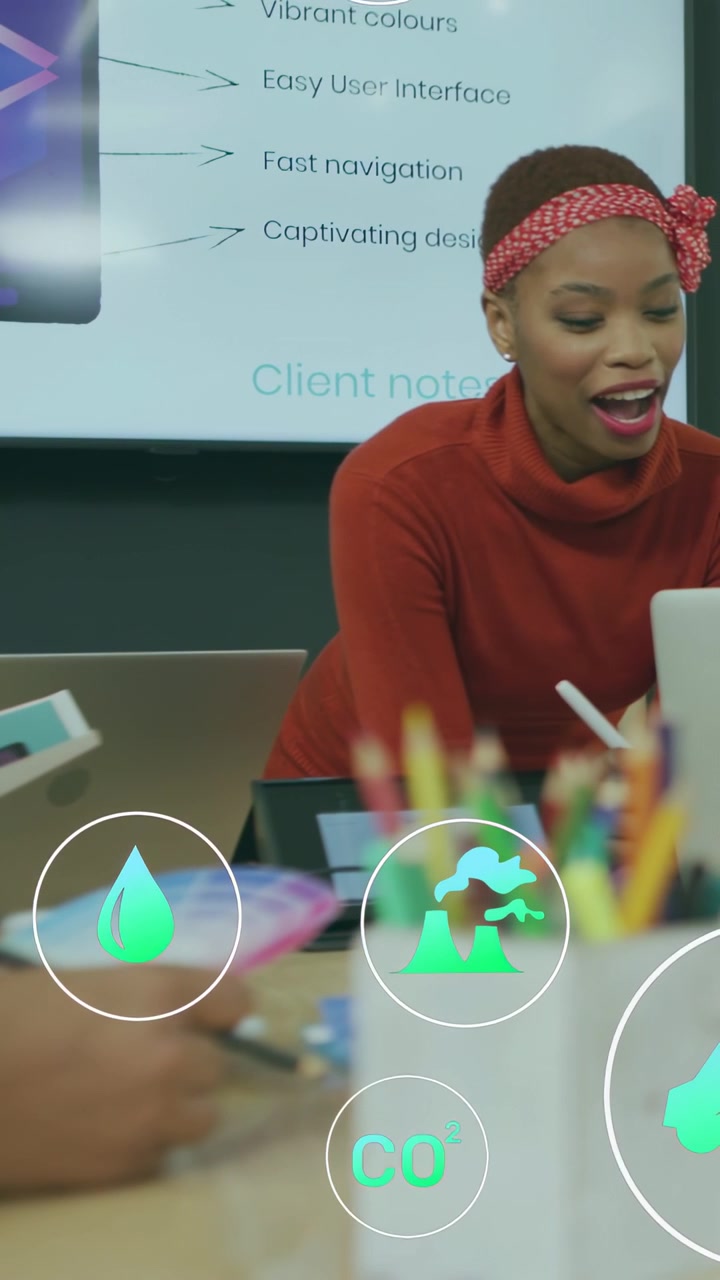 Vertical video: Team tapping tablet, lead speaking while AR icons moving over face, highlighting UI