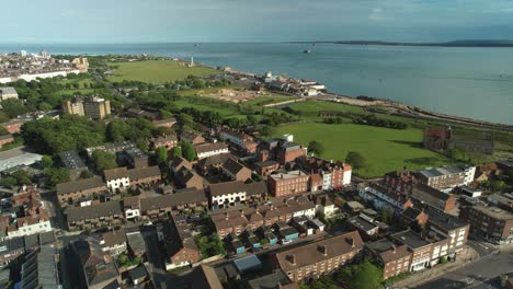 aerial view of the solent strait from portsmouth city with clarence pier amusement park, king's bastion fortress and portsmouth naval memorial park in england