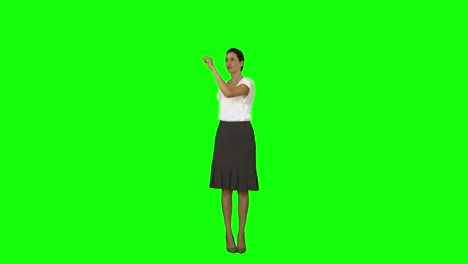 Businesswoman-standing-and-pointing