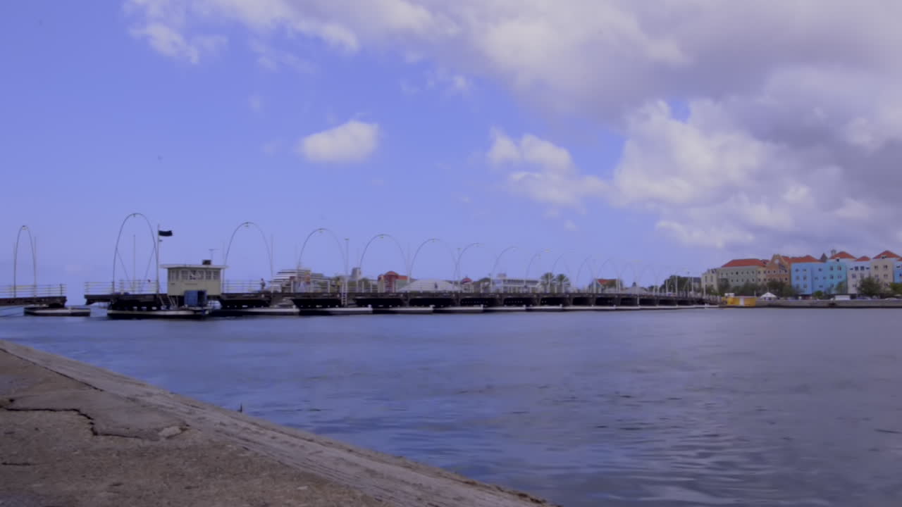 Queen Emma moving Bridge in Willemstad, Curaçao. Sint Anna Bay time lapse