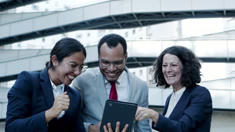 cheerful business people giving high five