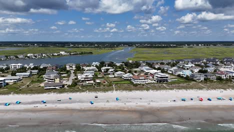 breathtaking scenic coastal view featuring waves and a beautiful sandy beachside enjoy a breathtaking aerial view of a tranquil beach with gentle waves and lush green hills surrounding it