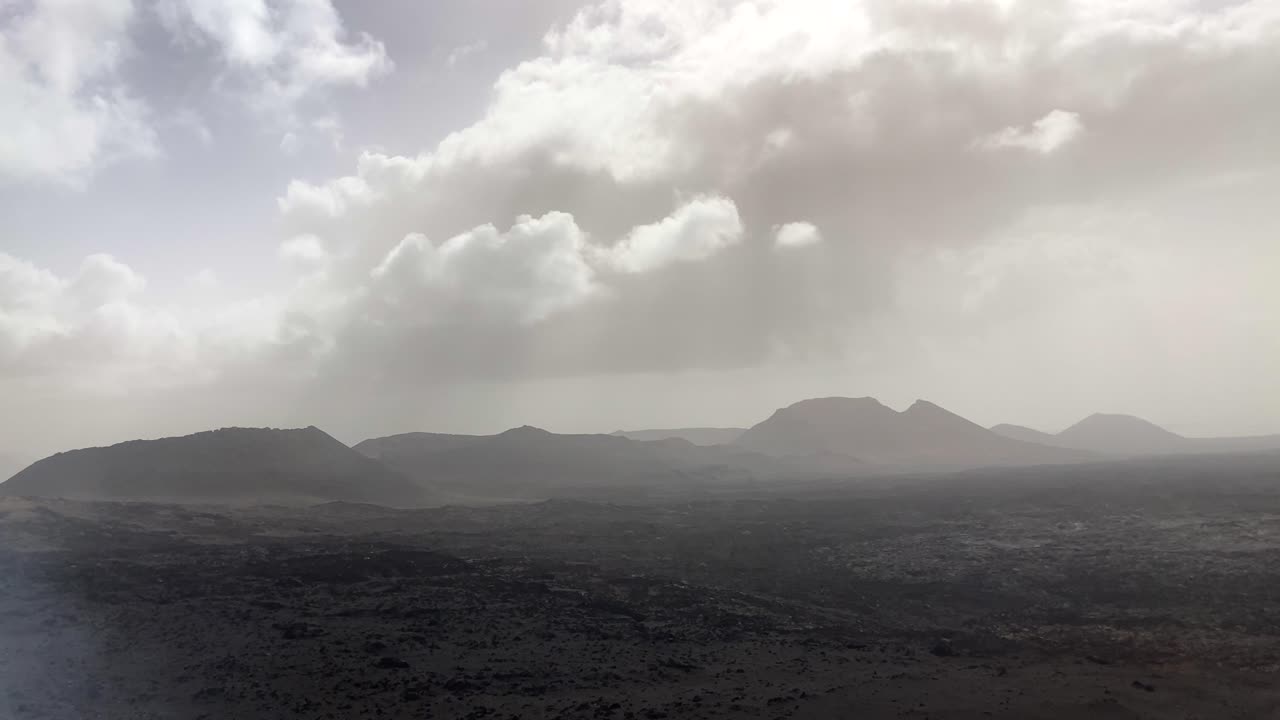 Smoke and steam coming from volcanoes in Timanfaya National Park, Lanzarote