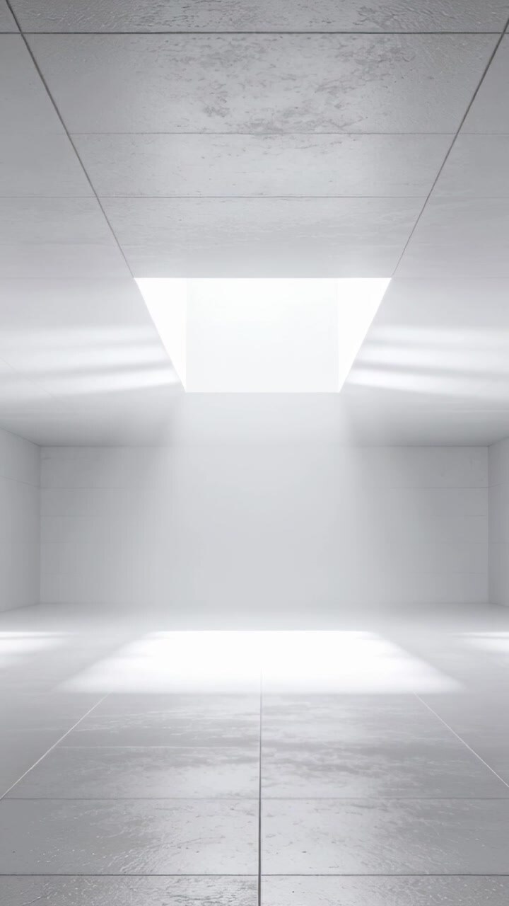 Vertical video: Sunlight entering skylight casting light column and floor patch in chamber