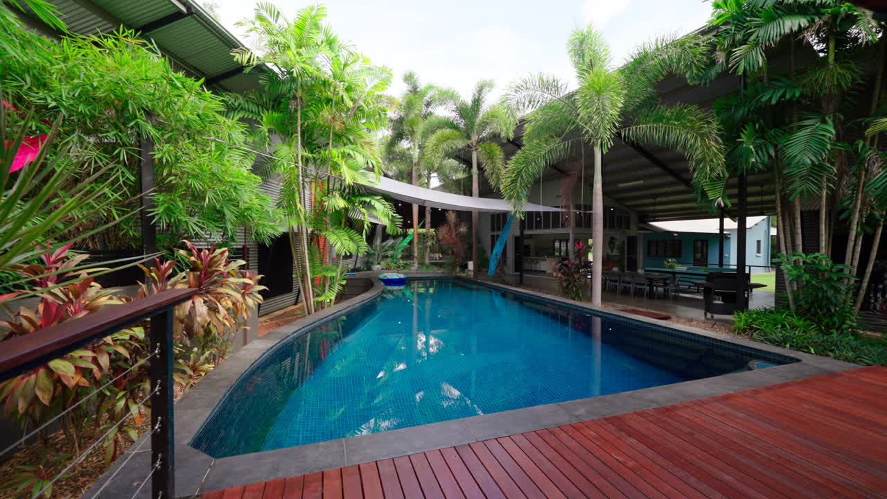 Rural Prestigious Tropical Style Home Relaxing Pool and Stained Wooden Deck Area, Perfect For Outdoor Gatherings and Parties