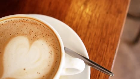 Cup-of-coffee-latte-at-counter