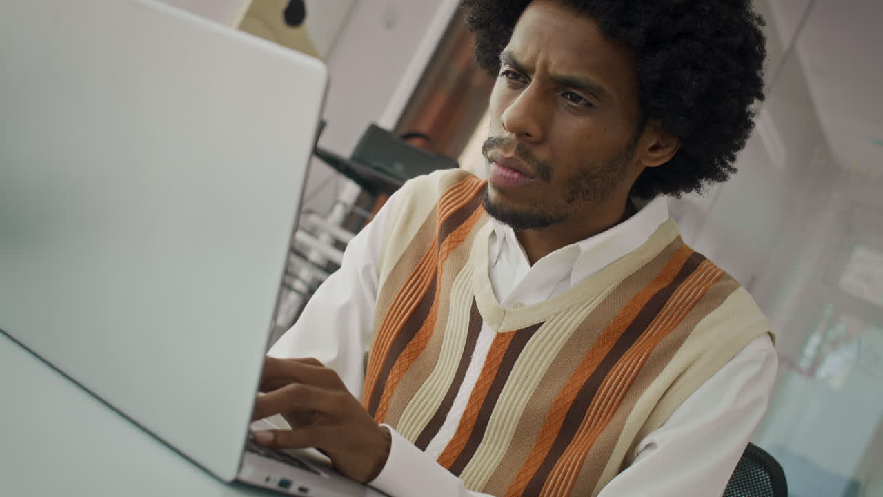 Stressed Businessman Being Sad about Report when Looking at Laptop