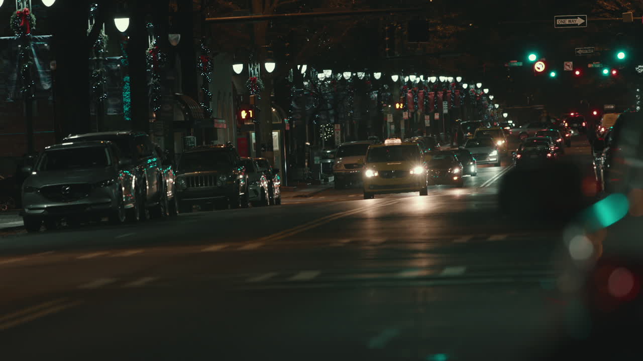 Night Traffic on a City Street During the Christmas Season