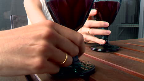 woman drinking wine outdoors