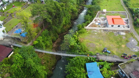 aerial view of the hanging bridge over the khola river in pokhara, nepal